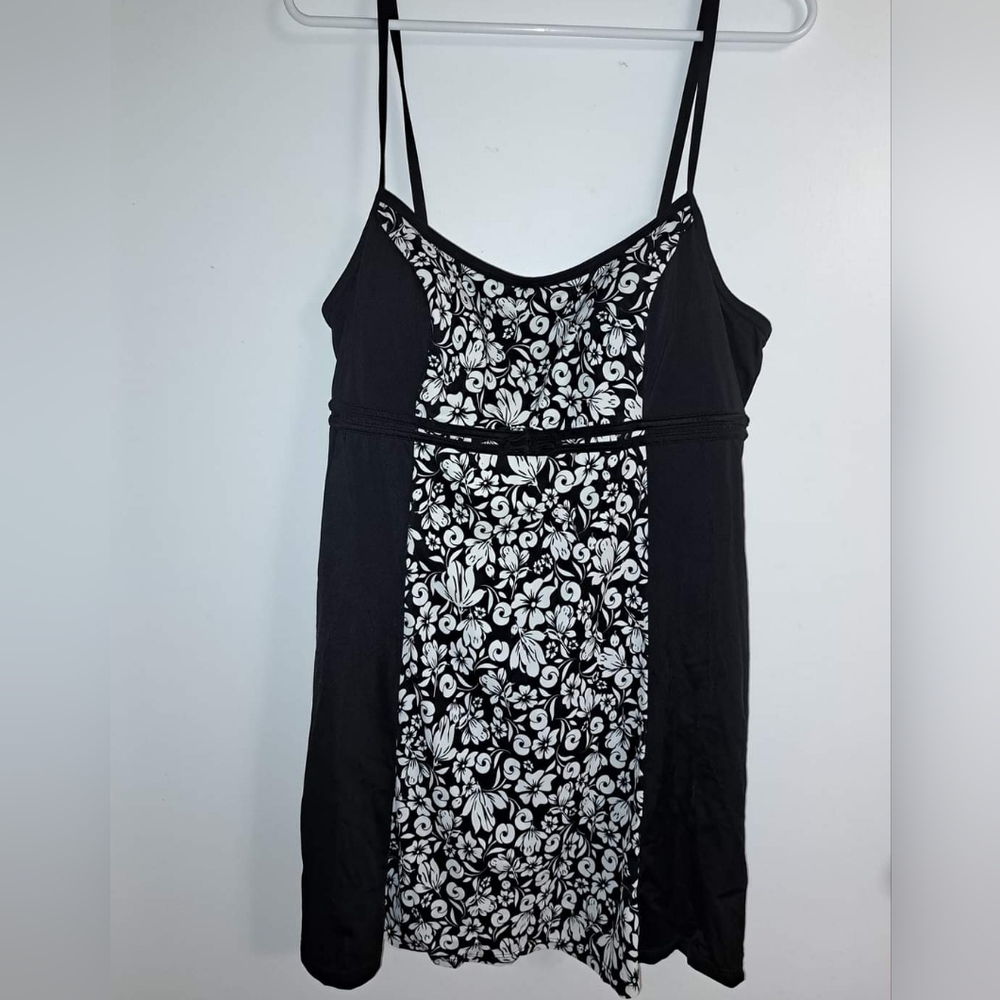 Black and white one piece swimsuit with cover skirt